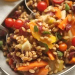Hearty Farro Bowl with Roasted Vegetables and a balsamic drizzle