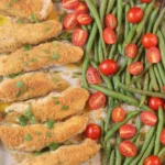 Oven-baked Sheet Pan Chicken Tenderloin with roasted vegetables.