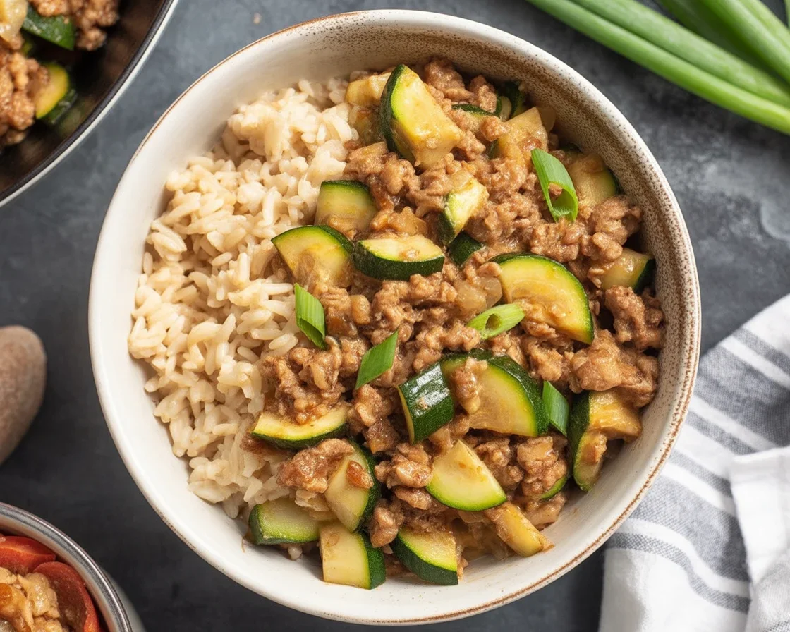 Healthy Ground Turkey and Zucchini Skillet meal with vegetables in a pan.
