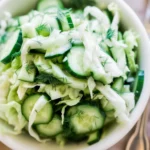 Green Cabbage Cucumber Salad with fresh herbs and dressing