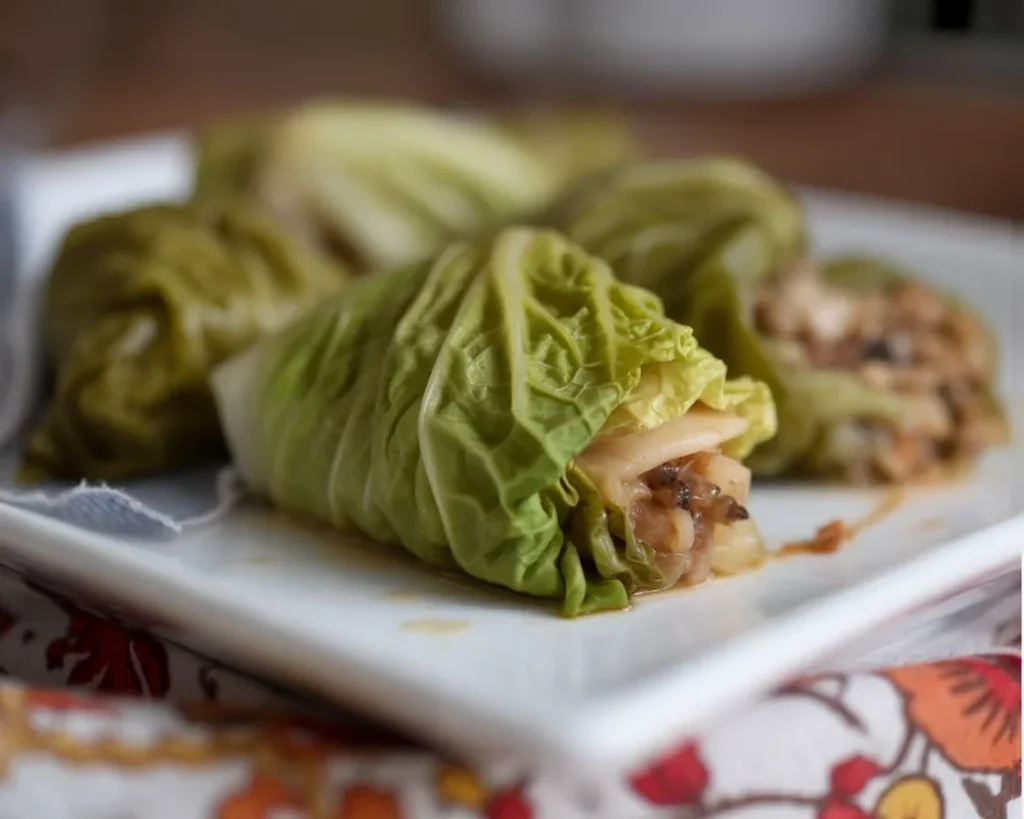 Asian Stuffed Napa Cabbage Rolls with savory filling and vibrant veggies